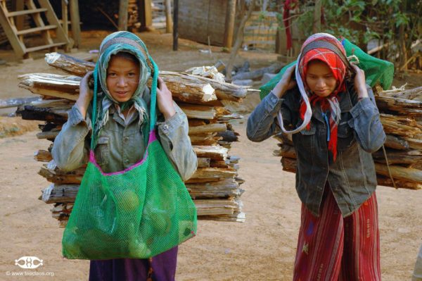 Kmhmu women using jungle vine bag in community lifestyle