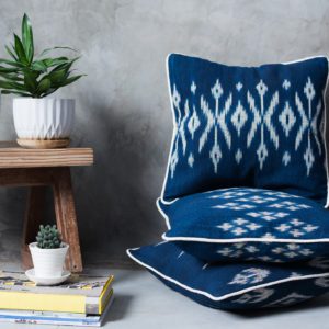 Stacked indigo ikat cushion covers blue from Laos