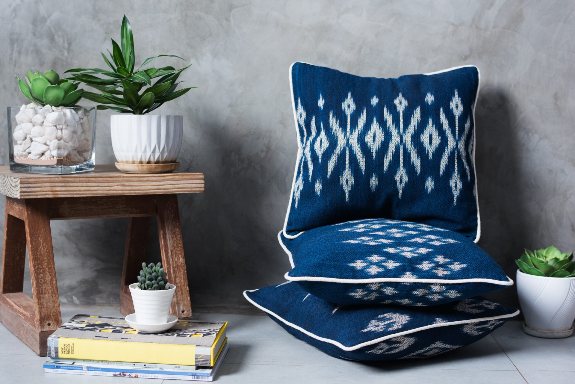 Stacked indigo ikat cushion covers blue from Laos