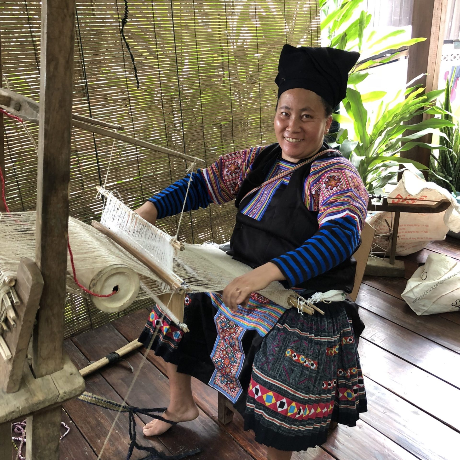 Hmong woman weaving hemp