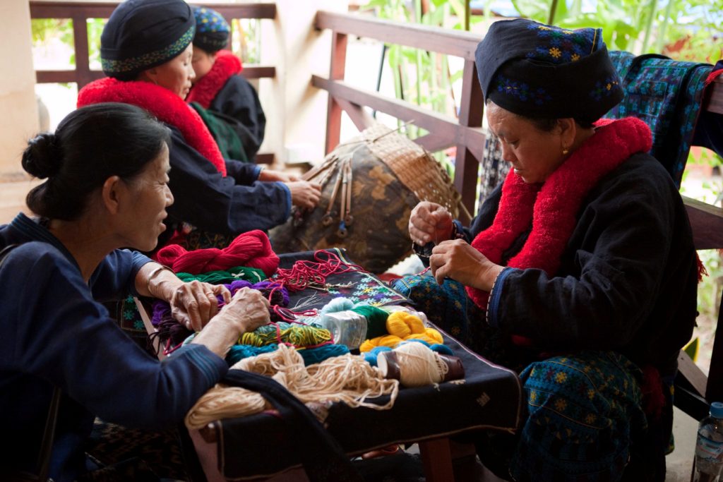 Iu Mien craftswomen working in the village Laos