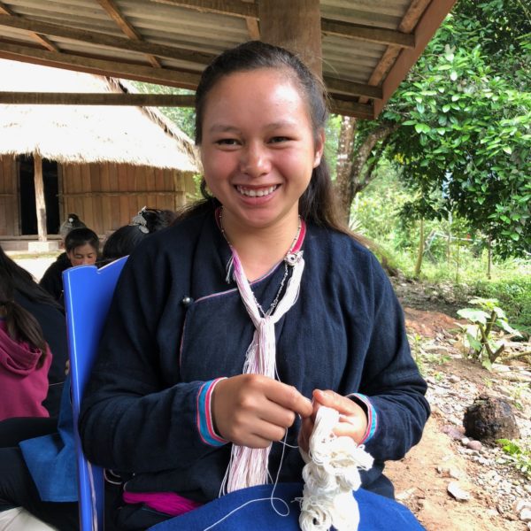 Lanten Yao Mun artisan doing embroidery in Laos