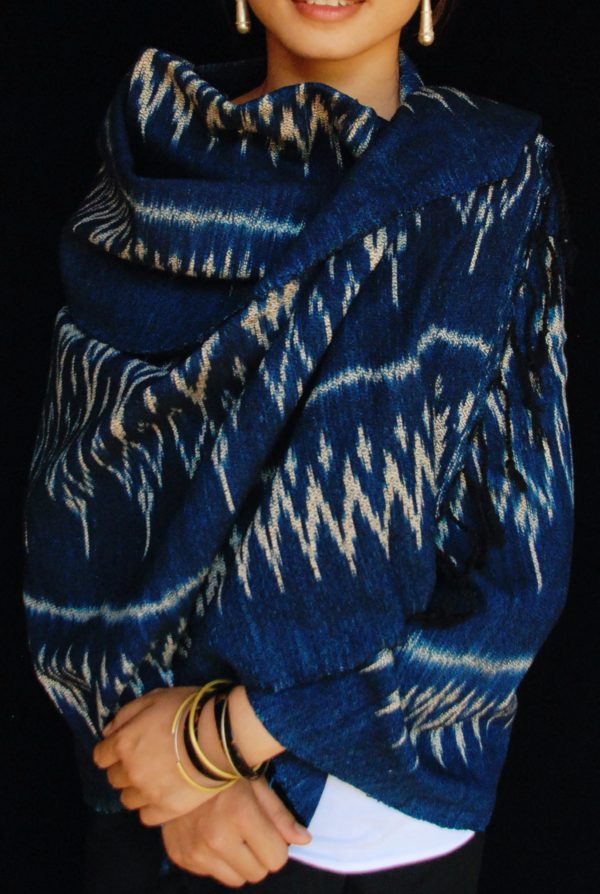 Model wearing Phou Tai handwoven indigo ikat shawl in Laos