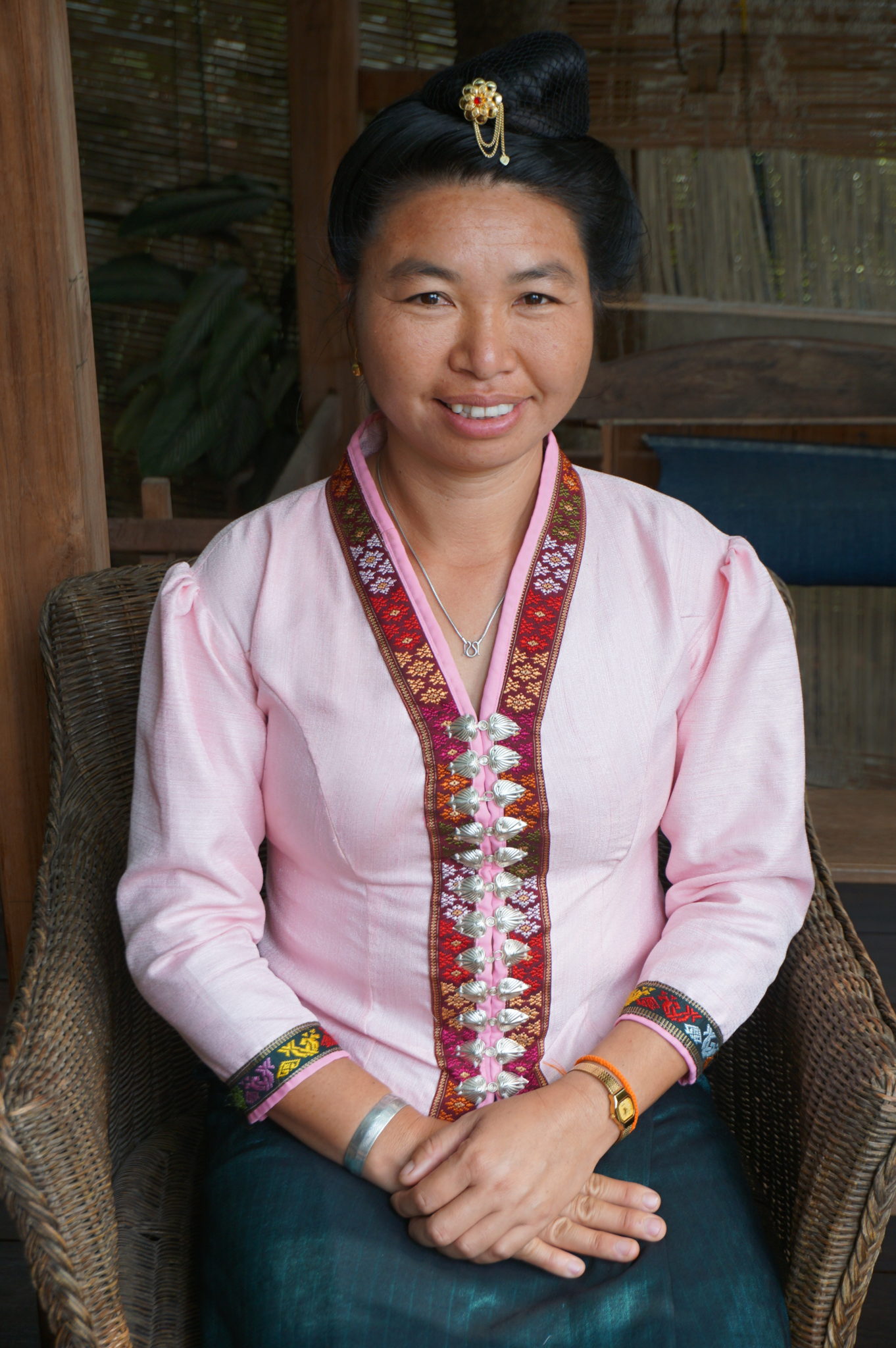 Tai Dam artisan wearing traditional clothing